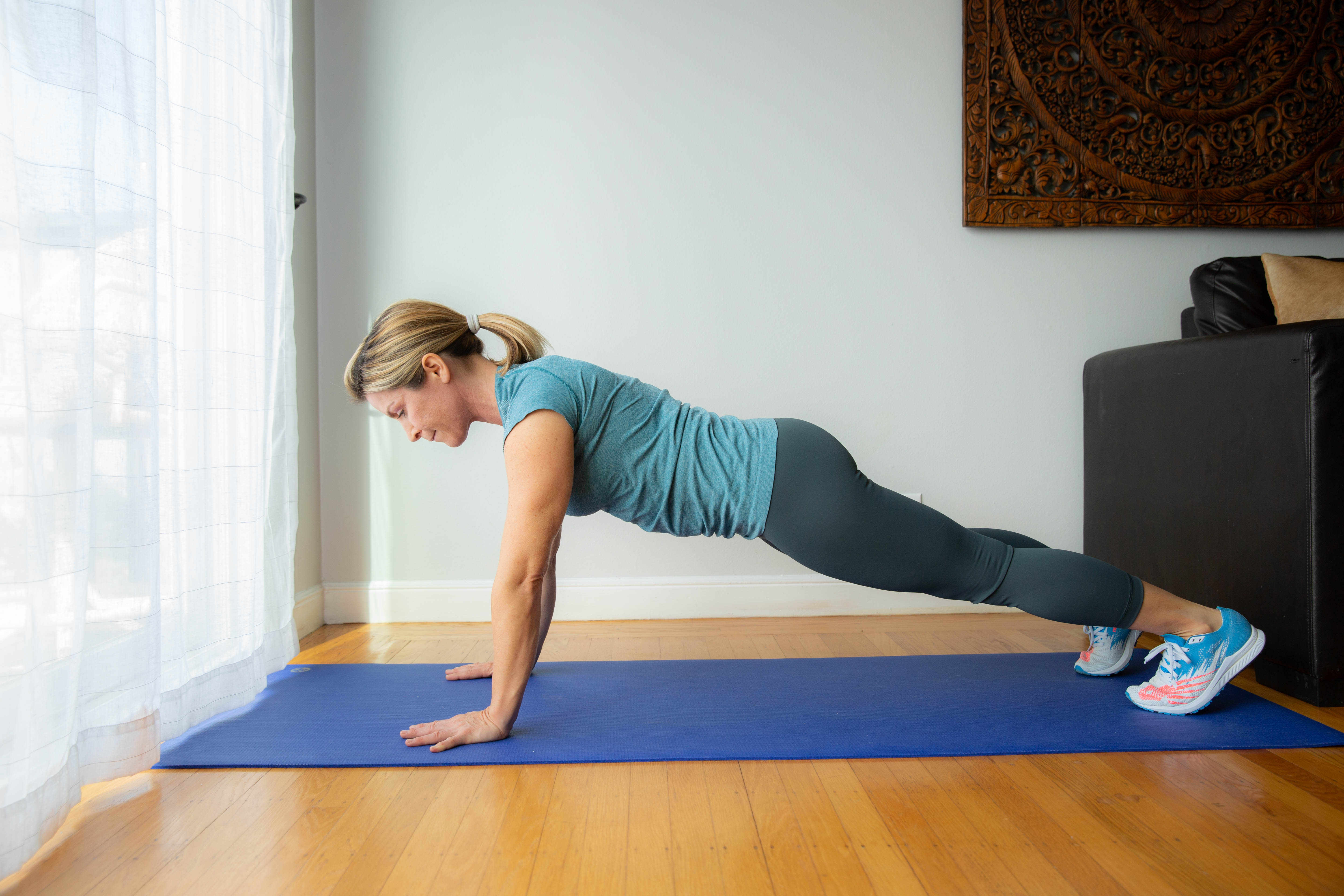 Megan Gathers in a plank position.